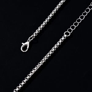 Silver alloy box chain necklace with lobster clasp and adjustable extension chain detail