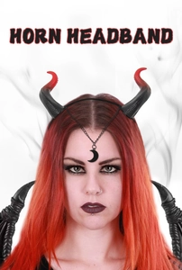 Detail of red and black devil horn headband with moon pendant and thin metal chains