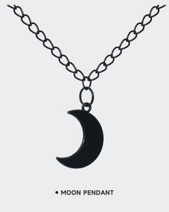 Detailed view of matte black crescent moon pendant on a matching oval link chain