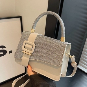 Glossy white PU leather handbag with silver sparkling diamonds and round top handle