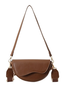 Brown semi-circle saddle bag with wavy flap design and dual stylish shoulder straps