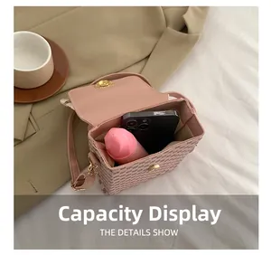 Internal capacity display of the pink monogram crossbody bag showing phone and cosmetics