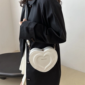 Minimalist white heart-shaped PU leather crossbody bag with fashion print for women
