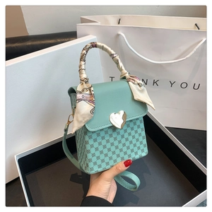 Mint green checkered crossbody box bag with golden heart lock and silk ribbon handle