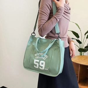 Large capacity light green canvas tote bag with retro lettering for casual styling