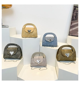 Mini crossbody bags with silver heart buckles and metal chains in various colors