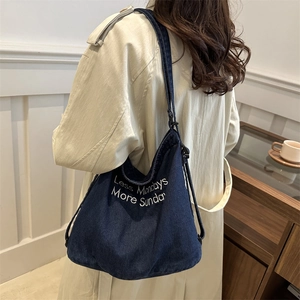 Navy denim tote bag with Less Mondays More Sundays embroidery for casual daily use