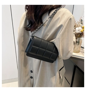 Classic black quilted square crossbody bag with silver metal chain and leather strap