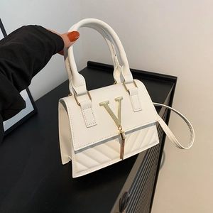 French style white quilted leather crossbody bag with gold V-metal tassel accessory