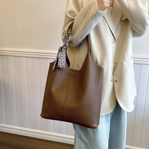 Deep brown pebble leather tote bag with silk scarf accessory for women office commuting