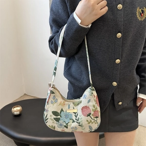 Retro floral tapestry crescent shoulder bag for women with elegant embroidery patterns