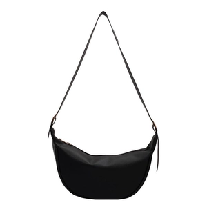 Minimalist black crescent moon shoulder bag with adjustable strap in matte finish