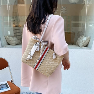Woven straw shoulder bag with red and white stripes and vintage silk scarf accent