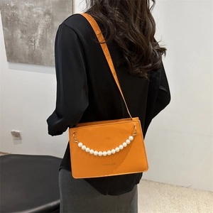 Orange square shoulder bag with pearl chain and fashion lettering in a chic style