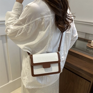 Retro crocodile pattern crossbody bag in white and brown leather on model