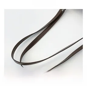Macro detail of dark brown leather tote handle featuring precise stitching and texture