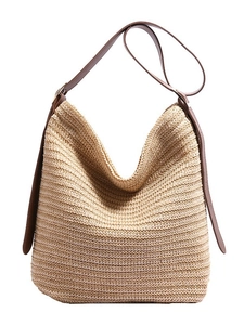 Minimalist beige straw bucket bag with dark brown leather strap and large capacity