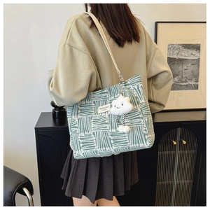 Women's canvas tote bag with green and white stripes and a cloud charm for daily commute