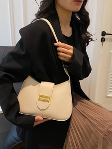 Minimalist beige half-moon underarm bag with gold metal lock for women stylish shoulder bag