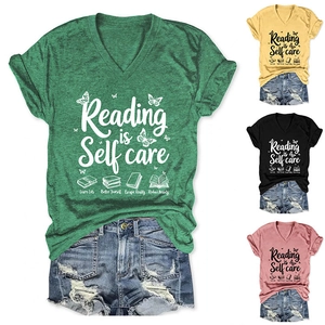 Detail view of V-neck T-shirt in four colors featuring Reading is Self Care print and books