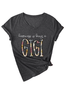 Detail view of dark grey V-neck T-shirt with floral GIGI print and side knot design