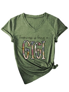 Detail of army green V-neck T-shirt with GIGI floral print and a knotted hem design