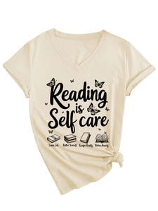 Detail of V-neck T-shirt showing Reading is Self Care print and butterfly book graphics