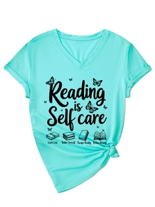 Detail of mint green V-neck T-shirt with butterfly book print and front hem knot design