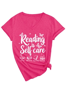 Detail of pink V-neck T-shirt with Reading is Self care print and side knot design