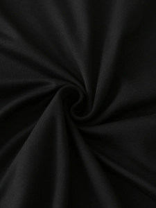 Close-up of black milk silk fabric showing high-density texture and soft drape detail