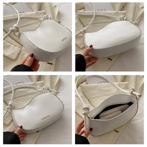 Detailed views of white half-moon bag showing interior space and gold logo on PU leather