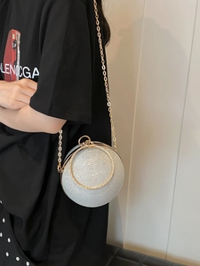 Sparkling silver round rhinestone evening clutch with gold crystal ring handle and chain