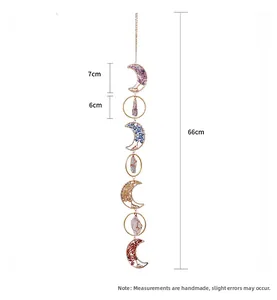 Detail view of colorful crescent moon crystals hanging on a 66cm long metal chain