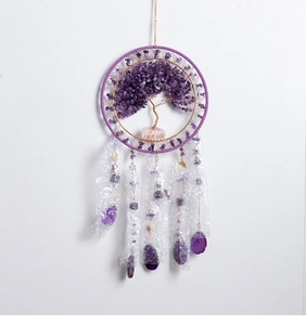 Macro detail of Tree of Life suncatcher featuring purple crystal stones and agate slices