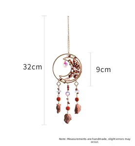 Detail of moon-shaped dream catcher with natural agate stones and tree of life beads