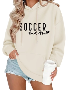 Detail of Soccer Mom heart print on a beige oversized cotton blend hoodie with kangaroo pocket