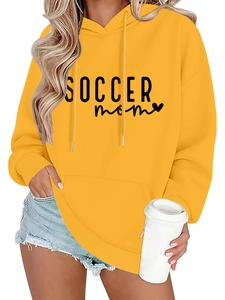 Detail view of the yellow Soccer Mom hoodie with heart print and adjustable drawstrings