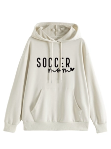Detailed view of SOCCER MOM lettering and heart print on oatmeal hooded sweatshirt