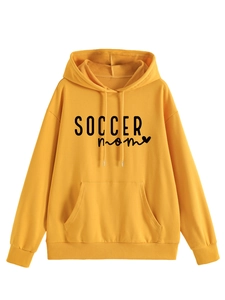 Detail of yellow Soccer Mom hoodie featuring kangaroo pocket and ribbed cuffs