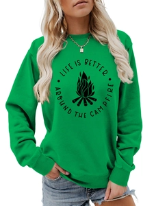 Close-up of green campfire sweatshirt showing ribbed neckline and graphic texture