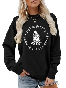 Close-up of Life is Better Around the Campfire slogan on black crewneck sweatshirt