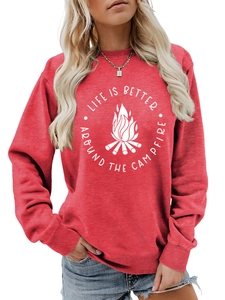 Detail of red crewneck sweatshirt featuring white campfire print and ribbed cuffs