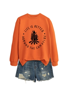 Detail of orange sweatshirt with Life is Better Around the Campfire graphic and bonfire print
