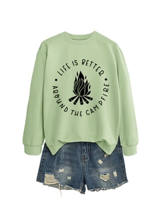 Close-up of Life Is Better Around The Campfire print on light green sweatshirt