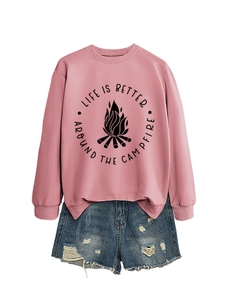 Detail of pink crewneck sweatshirt with Life is Better campfire print and denim shorts