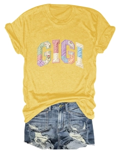 Detail of GIGI floral patchwork embroidery on a ginger short-sleeved cotton T-shirt