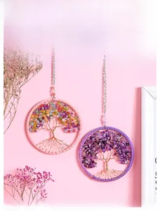 Detail of handmade Tree of Life wall hanging with colorful crystals and wire wrap