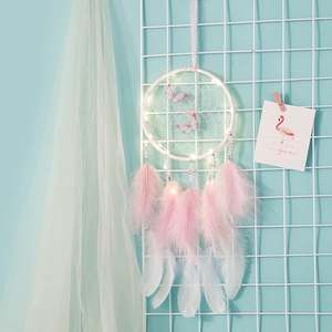 Pink and white feather dream catcher with colorful butterflies and LED lights decoration