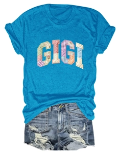Close-up of Gigi patchwork letter embroidery on blue cotton crewneck t-shirt