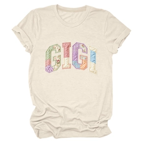 Close-up of GIGI patchwork letters on casual cream cotton short sleeve t-shirt